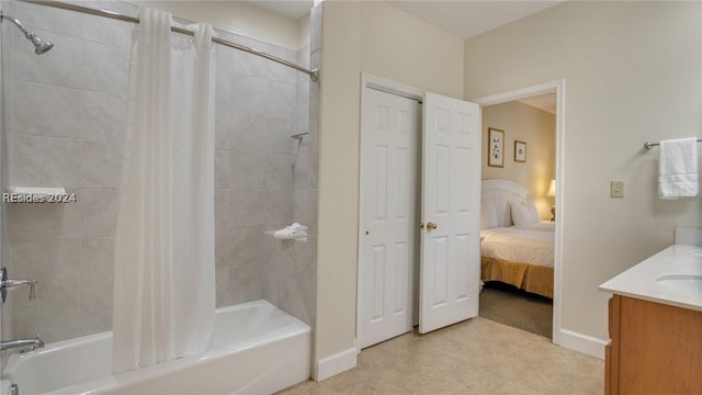 bathroom with shower / bath combination with curtain and vanity