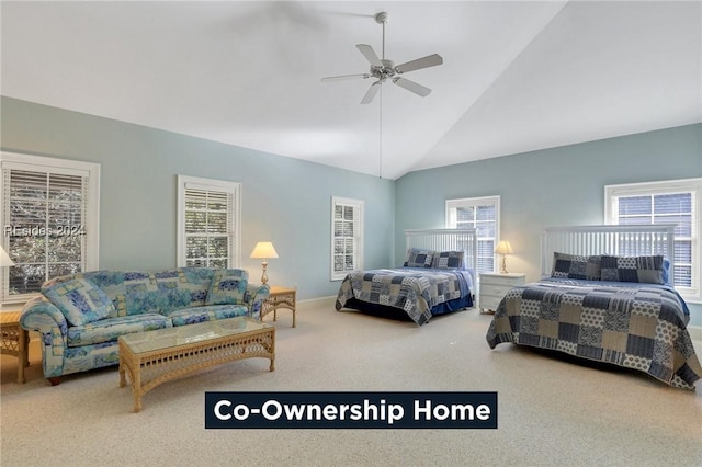 bedroom with multiple windows, vaulted ceiling, carpet floors, and ceiling fan