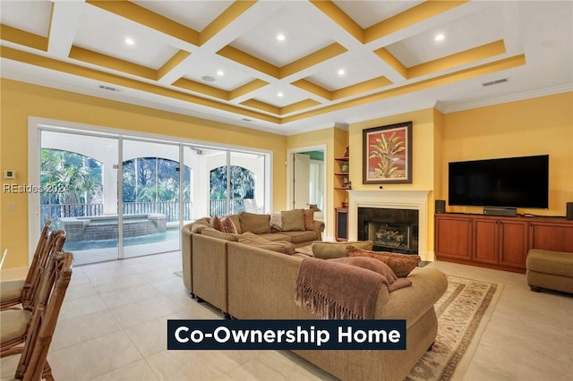 living room featuring crown molding, coffered ceiling, beam ceiling, and a wealth of natural light