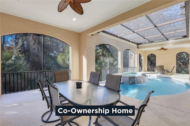 view of swimming pool featuring an in ground hot tub, ceiling fan, a patio area, and pool water feature