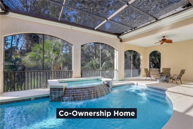 view of swimming pool featuring a patio area, ceiling fan, and an in ground hot tub