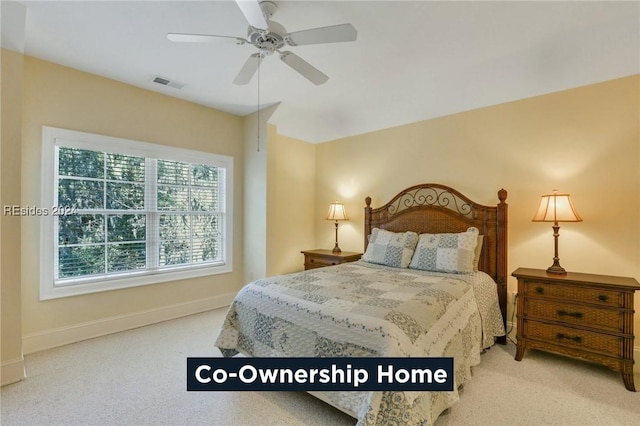 carpeted bedroom with ceiling fan