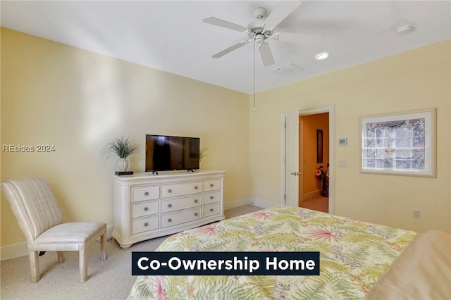 bedroom featuring ceiling fan and light colored carpet