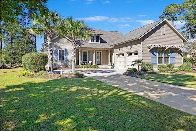 view of front of home featuring a garage and a front lawn