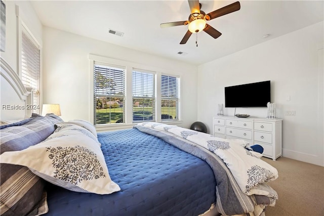 carpeted bedroom featuring ceiling fan