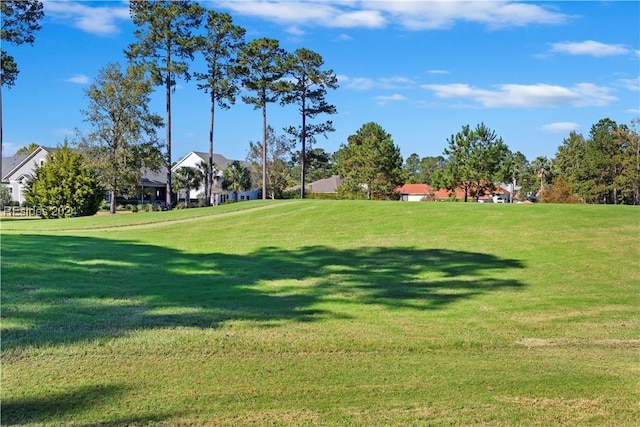 surrounding community with a lawn