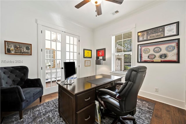 office featuring a baseboard radiator, ornamental molding, ceiling fan, and dark hardwood / wood-style flooring