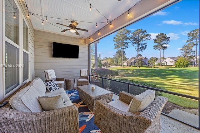 exterior space with outdoor lounge area and ceiling fan