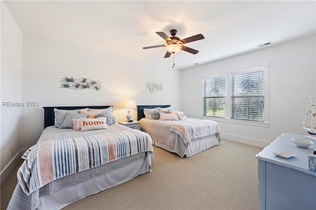 bedroom featuring ceiling fan and carpet flooring