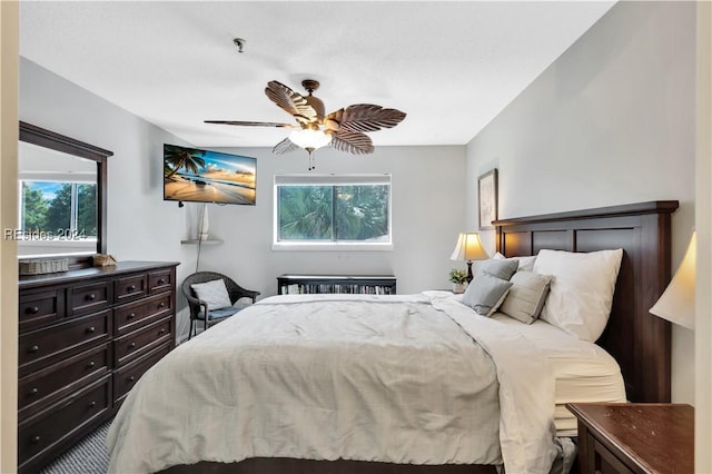 bedroom featuring ceiling fan