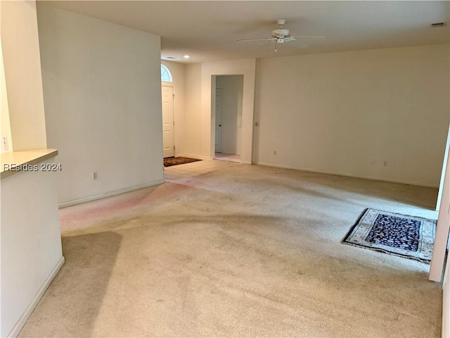 interior space featuring ceiling fan