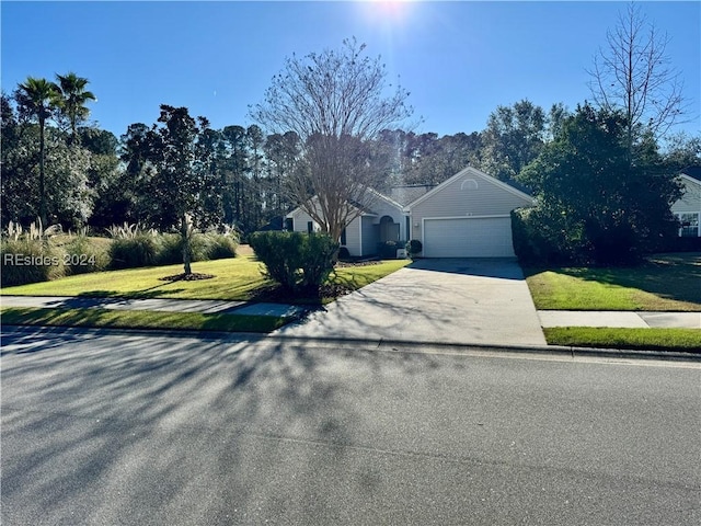 single story home with a garage and a front yard