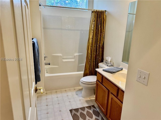 full bathroom with shower / tub combo, vanity, and toilet