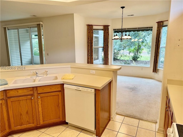 kitchen featuring sink, decorative light fixtures, a chandelier, light carpet, and white dishwasher