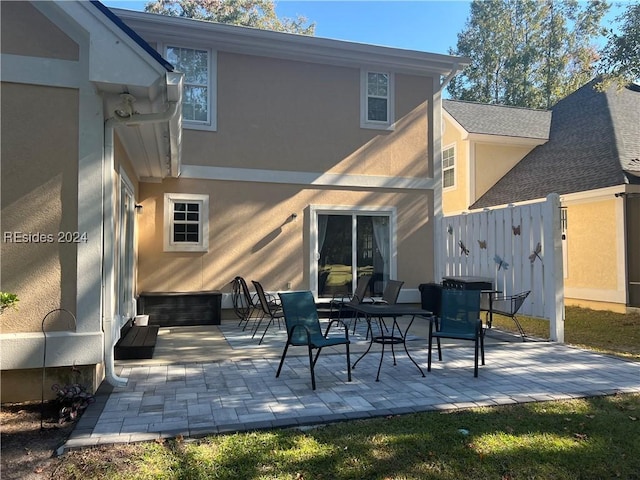 back of house featuring a patio area