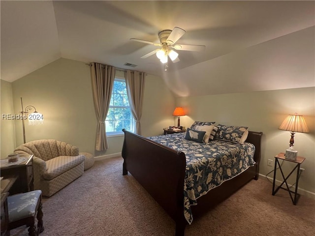 bedroom featuring lofted ceiling, ceiling fan, and carpet flooring