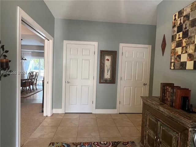 interior space featuring light tile patterned floors