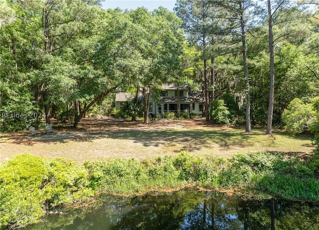 view of yard with a water view