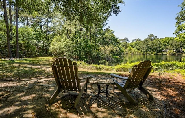 view of patio / terrace with a water view