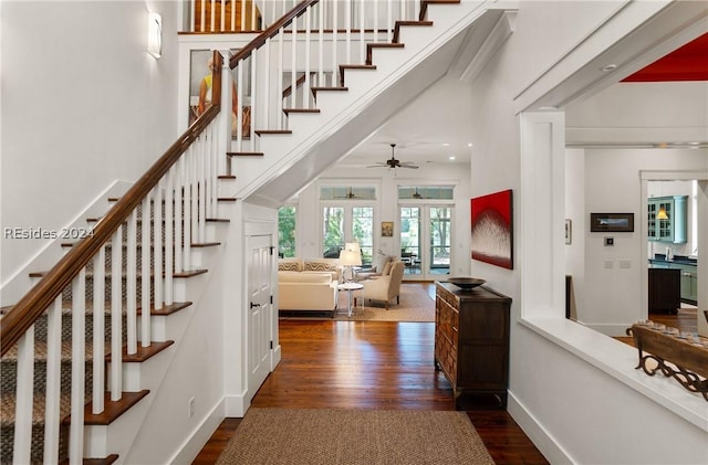 staircase with wood-type flooring