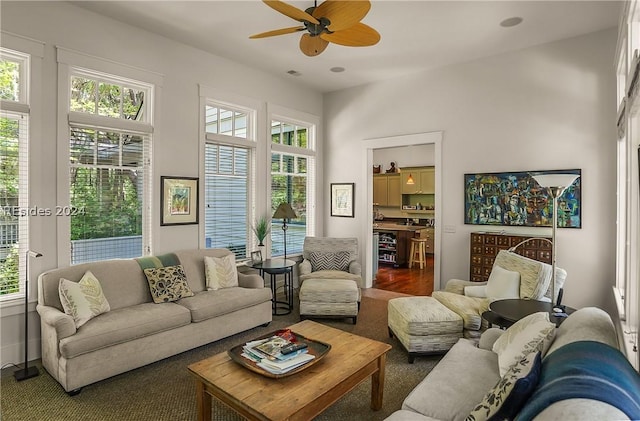 living room featuring ceiling fan