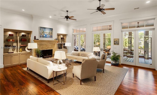 living room featuring hardwood / wood-style floors, plenty of natural light, and french doors