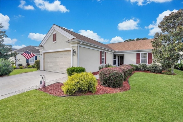 ranch-style house with a garage and a front yard