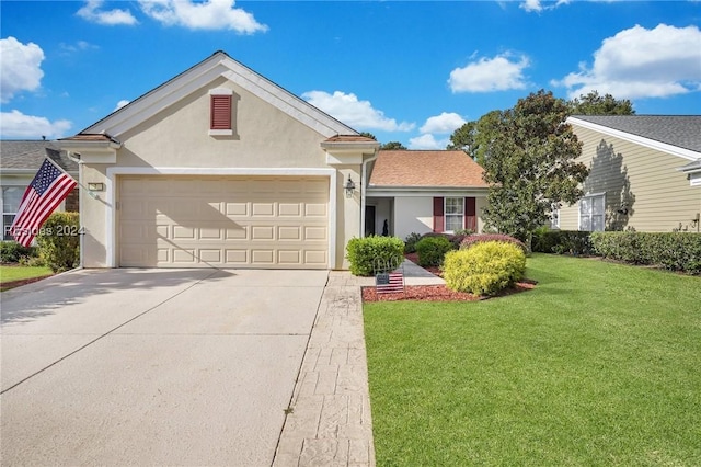 ranch-style home featuring a garage and a front yard