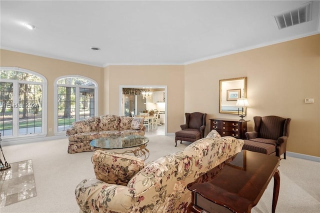 carpeted living room featuring ornamental molding