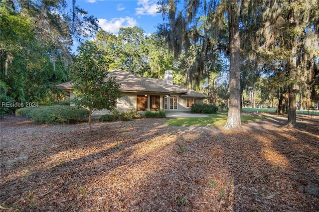 ranch-style house featuring a patio area