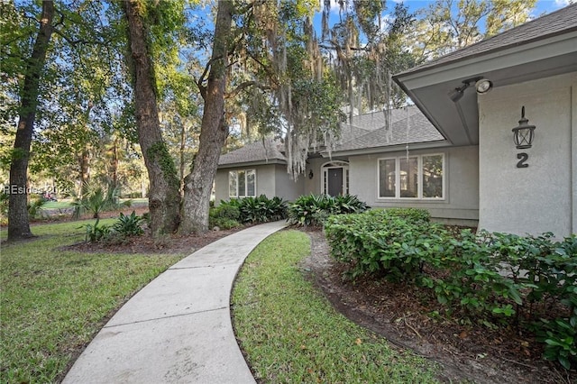 exterior space with a lawn