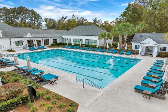 view of swimming pool with a patio area