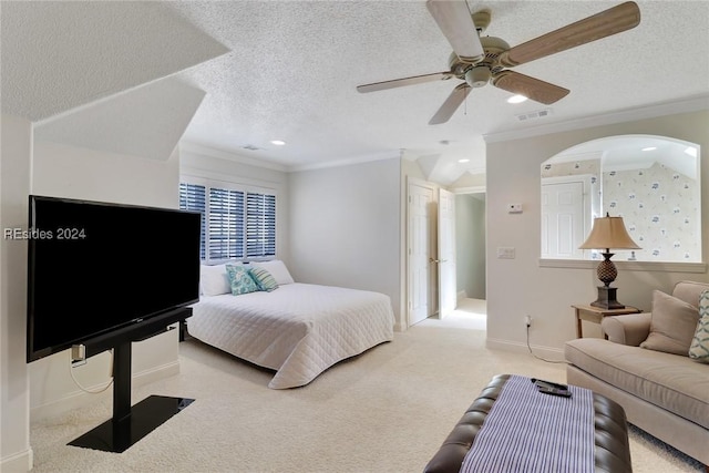 bedroom with light carpet, crown molding, a textured ceiling, and ceiling fan