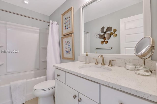 full bathroom with vanity, toilet, and shower / bath combo with shower curtain