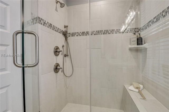 bathroom featuring an enclosed shower