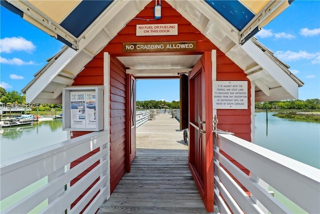 dock area with a water view