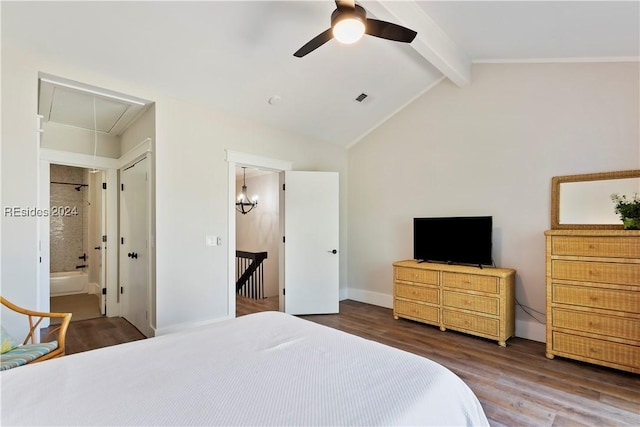 bedroom with ceiling fan, ensuite bathroom, dark hardwood / wood-style flooring, and vaulted ceiling with beams