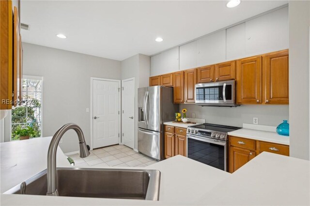 kitchen with appliances with stainless steel finishes and sink