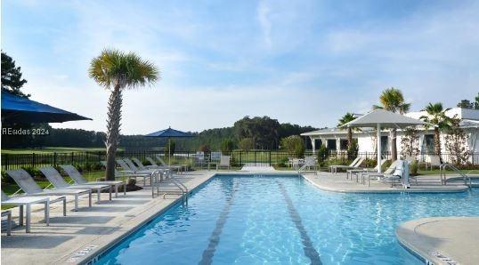 view of pool with a gazebo and a patio