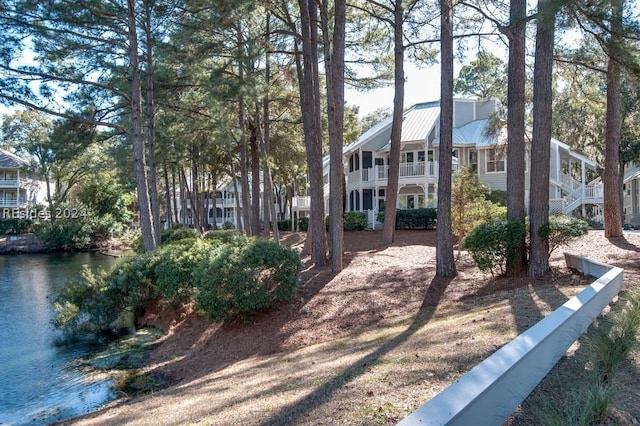 view of yard with a water view