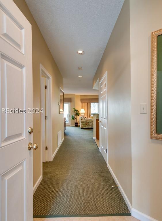 corridor with carpet