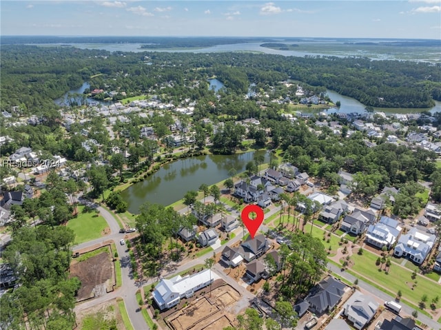 drone / aerial view with a water view