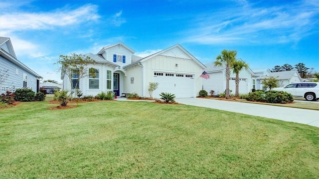 view of front of home featuring a garage and a front yard