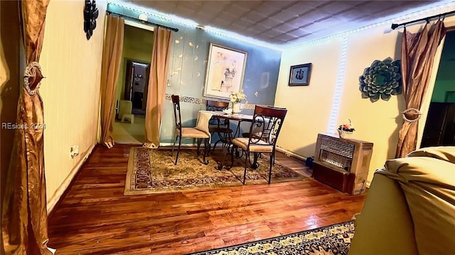 sitting room featuring crown molding and dark hardwood / wood-style flooring