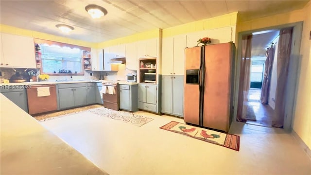 kitchen with white cabinetry, white range oven, dishwashing machine, and stainless steel fridge with ice dispenser