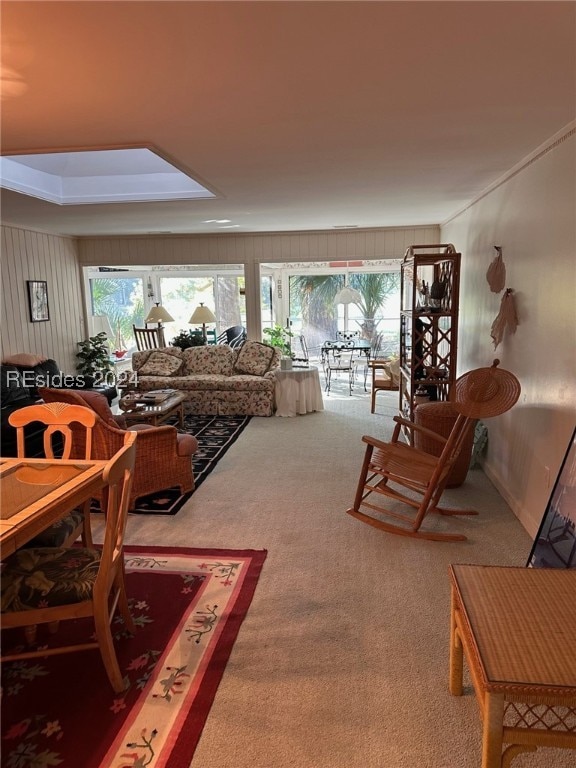 carpeted living room with a wealth of natural light