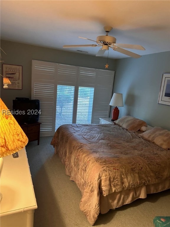 bedroom with carpet and ceiling fan