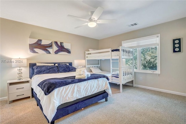 bedroom with light carpet and ceiling fan