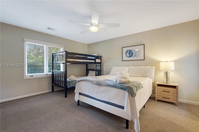 bedroom featuring ceiling fan and carpet floors