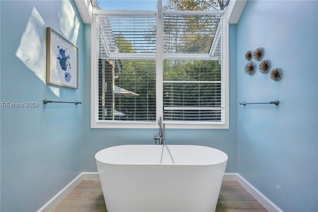 bathroom with a washtub